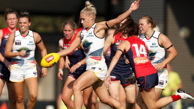 Adelaide star Erin Phillips launches clear of congestion. Picture: Michael Wilson.