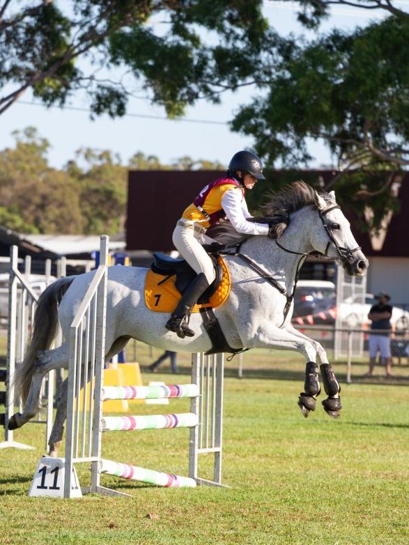 Kaylee Pasley and Prince Ferro at the PQC State Showjumping Championships.