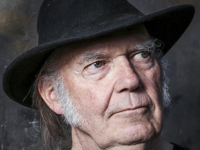 FILE - In this May 18, 2016, file photo, Neil Young poses for a portrait in Calabasas, Calif., to promote his new album, "Earth." Young penned an open letter on Facebook posted on Monday, Nov. 28, 2016, in which he calls for President Barack Obama â€œto step in and endâ€ what he calls the â€œviolenceâ€ against protesters demonstrating against an oil pipeline being built on part of an Indian reservation in North Dakota. (Photo by Rich Fury/Invision/AP, File)