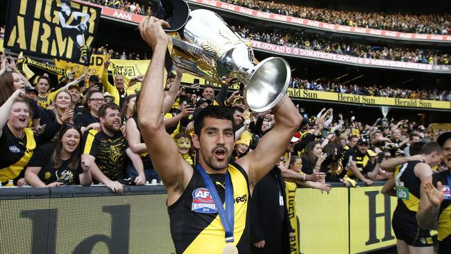 Marlion Pickett with the premiership cup. Picture: David Caird