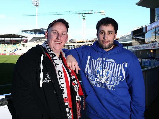 St. Kilda supporter Ben Preer, of Rokeby, and friend and North Melbourne supporter, Josh McMillan, of Tranmere.