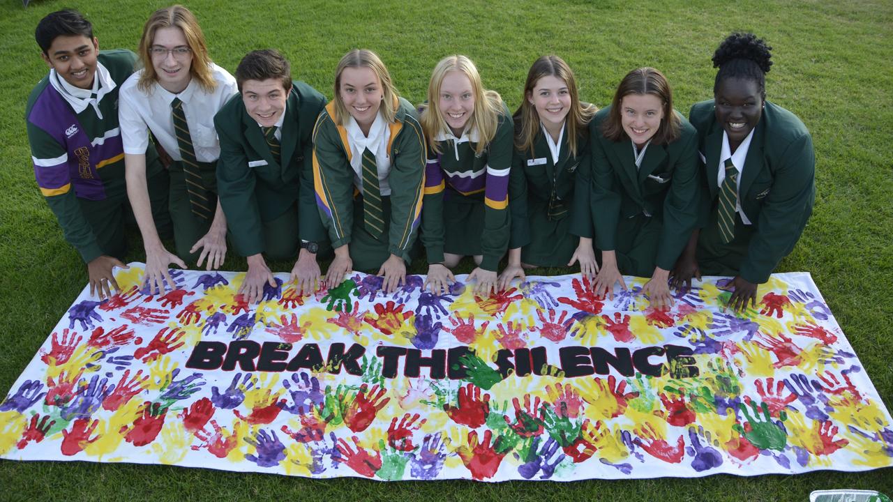 Centenary Heights State School students (from left) Tirth Panchal, Ryan Maynard, Dylan Hickey, Amy Skerman, Erica Wilson, Mia Jago, Ryleigh Parsons and Helen Jukuda, at the Toowoomba Domestic Violence Remembrance Ceremony and Walk.