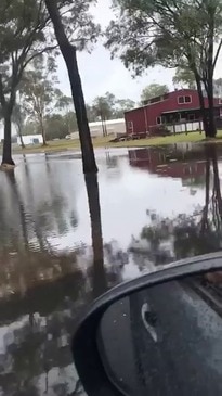 Tidal surge along streets of Boonooroo