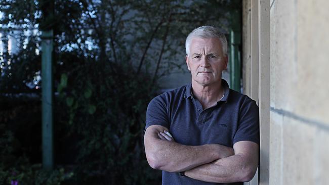 GP Doctor John Saul talks about the ongoing crisis with the state's health system at AMA House in South Hobart. Picture: LUKE BOWDEN