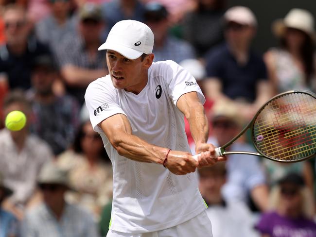 De Minaur shows plenty of sinew as he fires one back at Cristian Garin. Picture: Getty Images