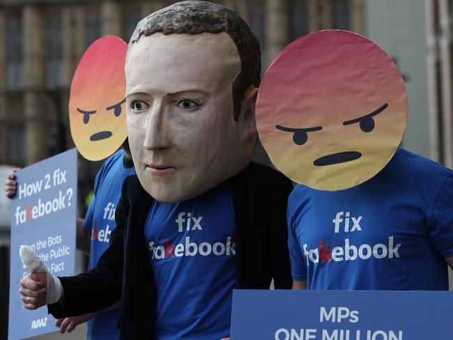 Protesters from the pressure group Avaaz demonstrate outside Portcullis house where Facebook's Chief Technology Officer Mike Schroepfer was questioned by members of parliament in London on April 26, 2018. Picture: Daniel Leal-Olivas