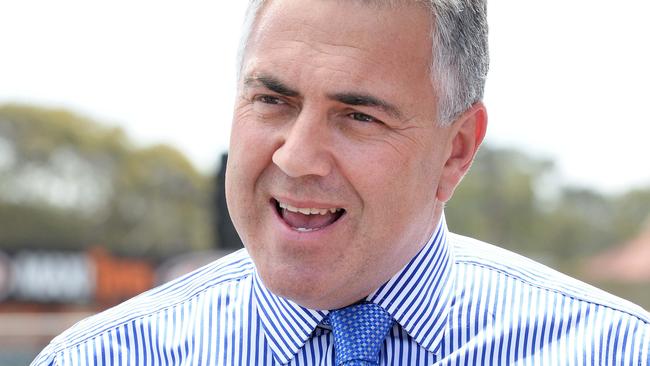Federal Treasurer Joe Hockey talking to workers and media at the Torrens to Torrens South Road upgrade at Thebarton.