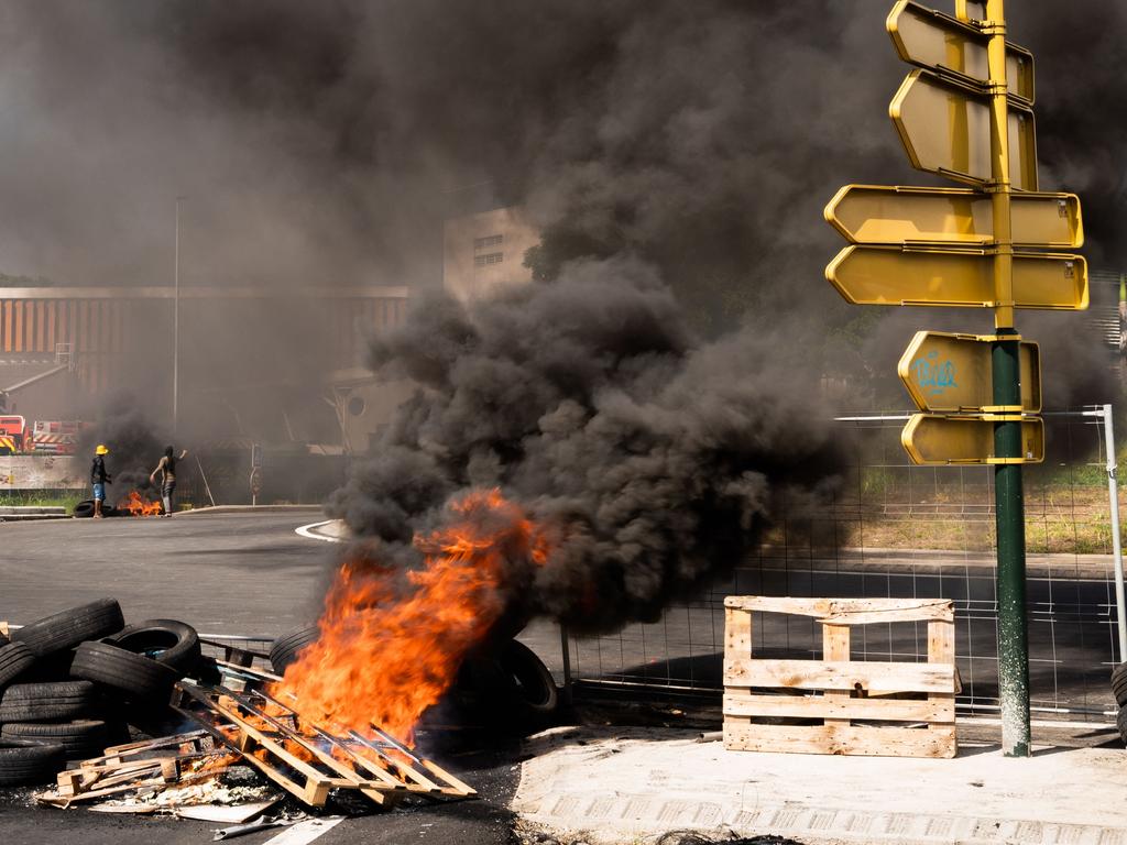 Militants of the 'Union generale des travailleurs de Guadeloupe' set fires in Guadeloupe. Picture: Carla Bernhardt/AFP