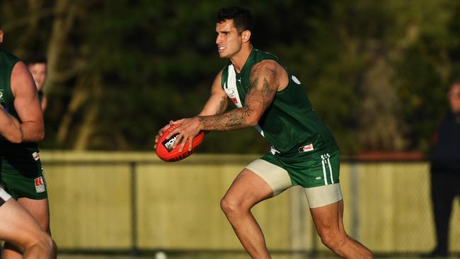 Steve Colisimo gets a kick away for Wantirna South. Picture: James Ross/AAP