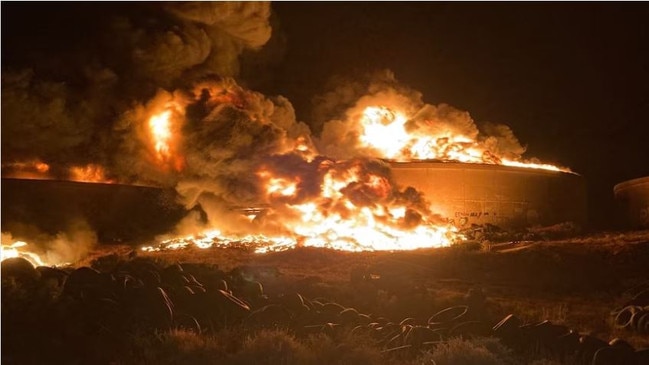 Old tyres and concrete tanks on fire the site known as ‘The Tanks’. a local landmark about 26km south-west of Port Augusta. Picture: Country Fire Service