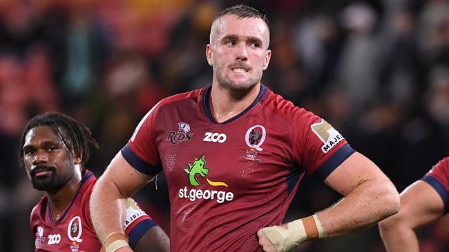 Izack Rodda of the Reds (right) reacts following the Round 15 Super Rugby match between the Queensland Reds and the Highlanders at Suncorp Stadium in Brisbane, Saturday, May 26, 2018. (AAP Image/Dave Hunt) NO ARCHIVING, EDITORIAL USE ONLY