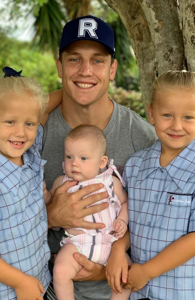 Gold Coast Titans star Jarrod Wallace with daughters Kennedy, 1, Peyton, 5, and Lara, 7. Photo: Supplied.