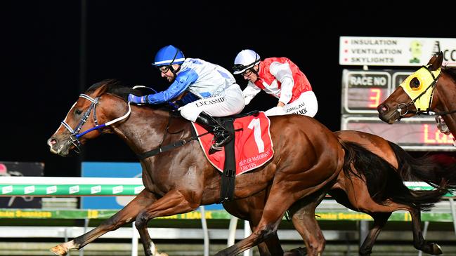 Thunder Mania winning at Caloundra for co-trainers John Symons and Sheila Laxon. Picture: Trackside Photography