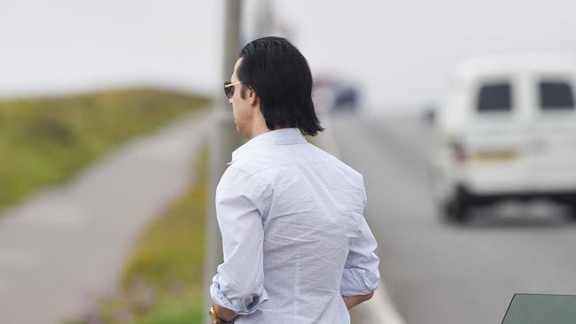 Grieving ... Rocker Nick Cave visits the scene where his son fell to his death. Picture: Solent / Picture Media