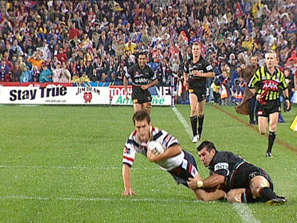 Scott Sattler produced a tackle-for-the-ages to deny Todd Byrne in the Panthers’ 2003 grand final win. Picture: Channel 9