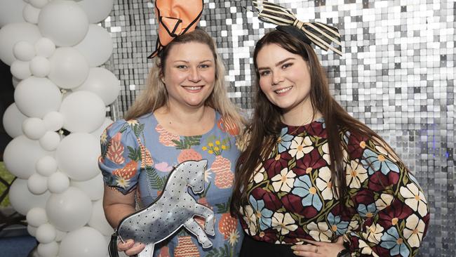 Sisters Tash (left) and Emma Canning at Emergency Services race day at Clifford Park, Saturday, August 10, 2024. Picture: Kevin Farmer