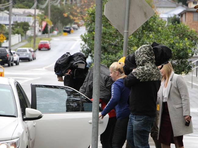 Ms Belthikiotis (orange shirt) became “scared of the media” after she left court pursued by cameras and journalists following her first appearance in May. Picture: Fiona Killman