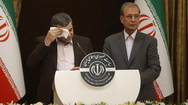 A coughing and heavily sweating Iraj Harirchi, left, assured Iranians “the situation is almost stable in the country’’. A day later he tested positive for the illness himself.