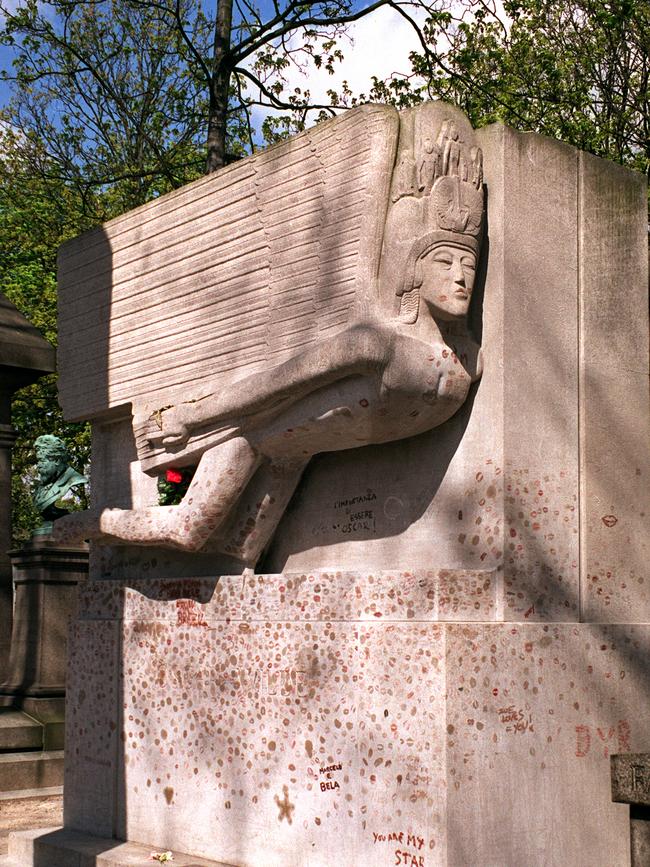 Oscar Wilde’s tomb at Pere Lachaise. A glass barrier was erected in 2011 to stop people kissing it. Picture: Jenny Stevens