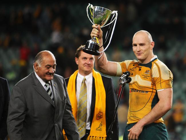 Stirling Mortlock, a former Lindfield rugby junior, lifts the trophy after the Nick Shehadie Cup match between the Australian Wallabies and the Barbarians at Sydney Football Stadium in 2009. Pic: Mark Kolbe/Getty Images.