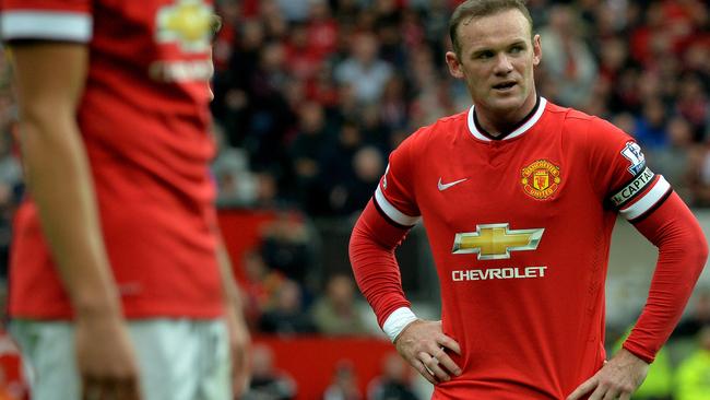 Manchester United's new skipper Wayne Rooney not too happy with his team.