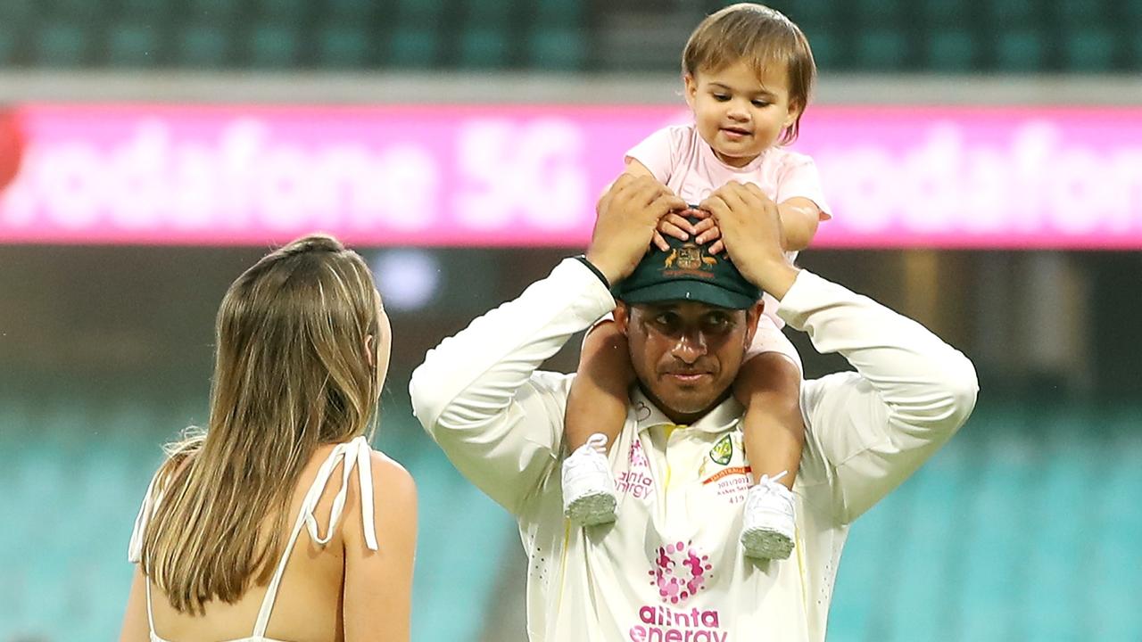 Usman Khawaja with his wife and daughter. Photo by Mark Kolbe/Getty Images