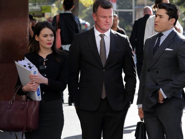 Anthony Bell and his legal team arrive at the Downing Centre today. Picture: John Fotiadis