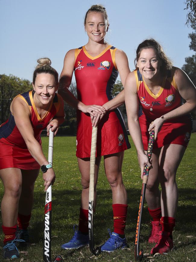 Former Hockeyroo Holly Evans, with current Australian players Jane Claxton (centre) and Karri McMahon (right) all with play for the Suns in the AHL on Sunday. Picture Sarah Reed