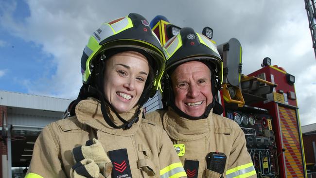 Belmont firefighter Graham Lane is retiring after 35 years on the job. Pictured with his daughter Becky Linke, who is also a firefighter. Picture: Alan Barber