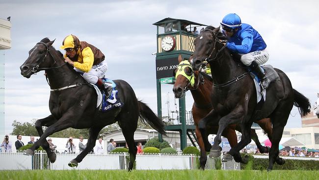 Alpine Eagle (left) takes out the 2015 Autumn Classic at Caulfield. Picture: George Salpigtidis