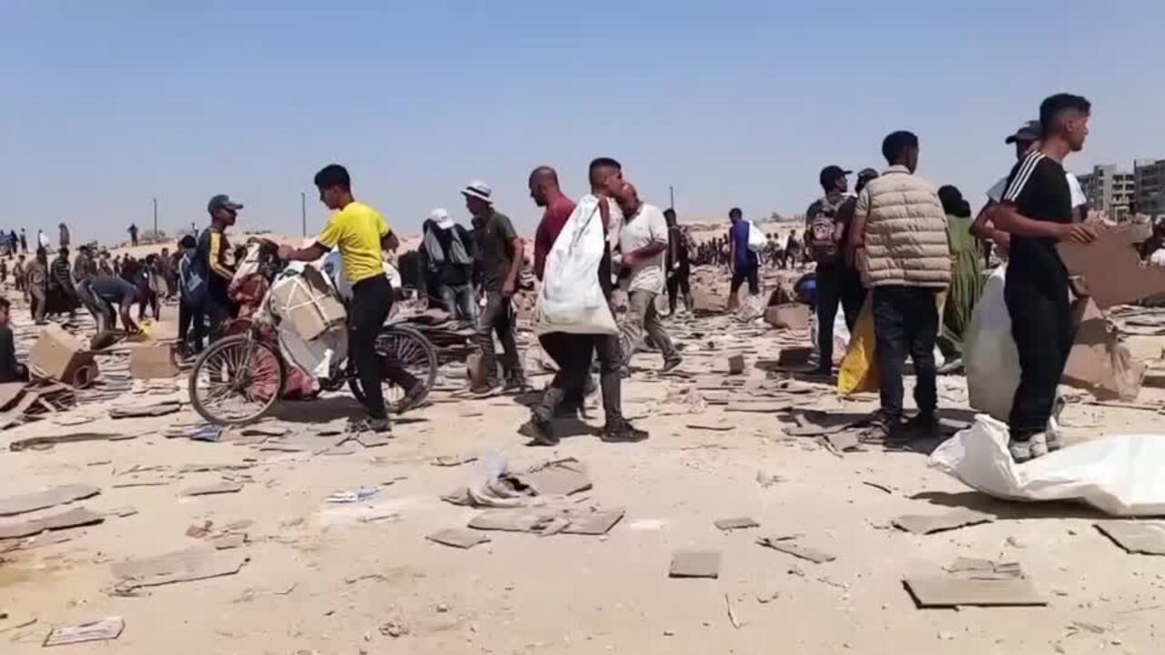 US group distributing aid in Gaza reopens sites after delays