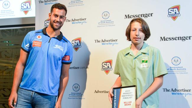 Cricketer Wes Agar with Primary category winner William Brown from Magill School. Picture: Brenton Edwards