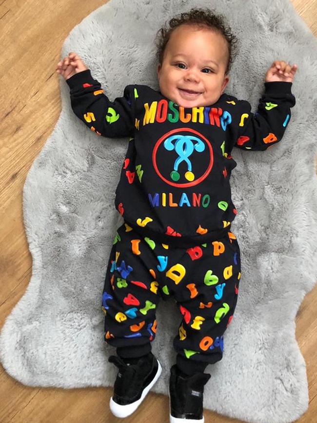 The toddler is dressed head to toe in Gucci, Versace and Moschino. Picture: Simon Jacobs/Caters News