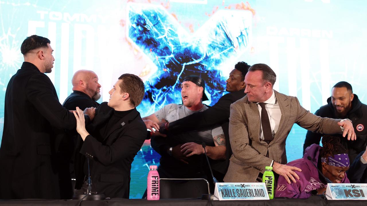 Security swarmed the stage. (Photo by Julian Finney/Getty Images)