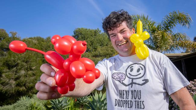 David “Juggs” Russell making balloon animals at his property in Aldinga Beach. Picture: Ben Clark