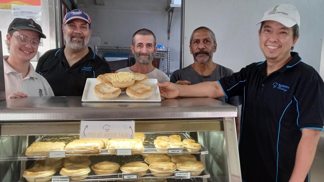 Babinda Bakery has been voted FNQ's best pie joint by Cairns Post readers, eight weeks after owner Bun Keo, pictured with his staff, took over the business. Photo: Supplied.