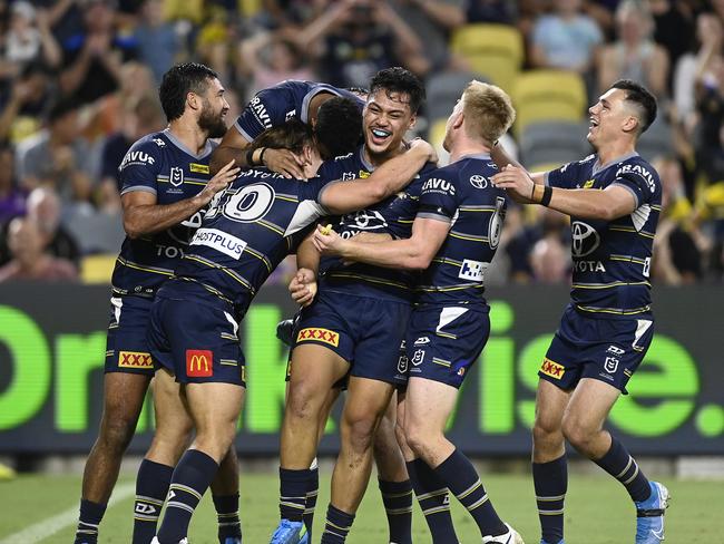 TOWNSVILLE, AUSTRALIA - MAY 21:  Jeremiah Nanai of the Cowboys celebrates after scoring a try  during the round 11 NRL match between the North Queensland Cowboys and the Melbourne Storm at Qld Country Bank Stadium, on May 21, 2022, in Townsville, Australia. (Photo by Ian Hitchcock/Getty Images)