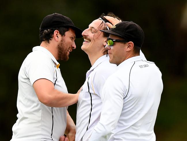 Heidelberg celebrate the dismissal of Robert Phelan of Diamond Creek during the DVCA Barclay Shield match between Heidelberg and Diamond Creek at Banyule Flats Reserve, on November 25, 2023, in Melbourne, Australia. (Photo by Josh Chadwick)