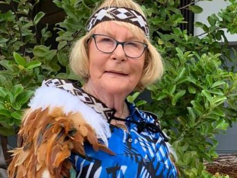 Southport councillor Dawn Crichlow at Waitangi Day after receiving a traditional Maori headband and cloak.