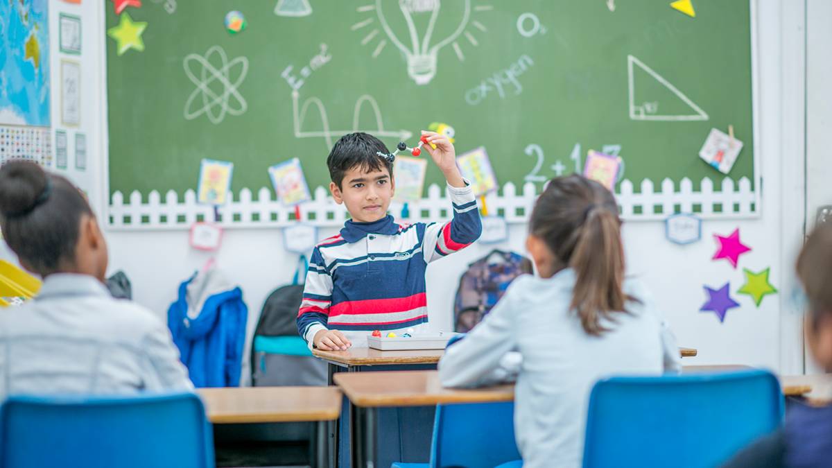 It's profit show-and-tell time for three of our global healthcare heroes – and 'teacher' is largely happy. Pic via Getty Images