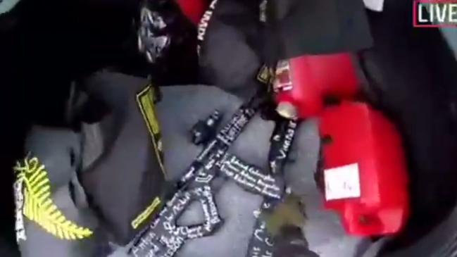 Screengrab of footage live streamed by the shooter, featuring guns with white names painted on them. Source: YouTube