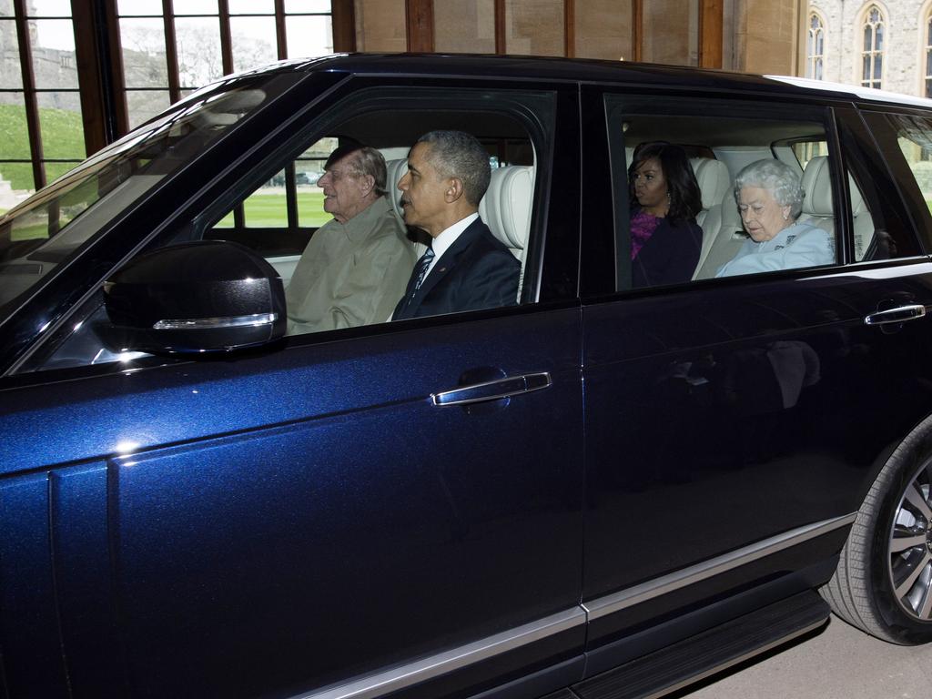 Prince Philip drives the Queen and the Obamas at Windsor in 2016. Picture: WPA/Getty Images