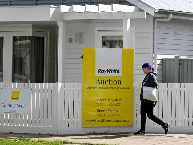 What impact would raising the interest rate have on house prices, employment and economic growth. Picture: William WEST / AFP