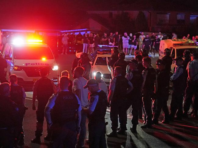 THE DAILY TELEGRAPH. 15 April, 2024, Wakeley, Sydney, NSW. Damage to Police cars as Police respond to a Public Order Incident after a large mob congregated at Christ The Good Shepherd Church where Bishop Mar Mari Emmanuel was stabbed multiple times as he delivered a sermon which was live streamed online. Photo: Michelle Haywood