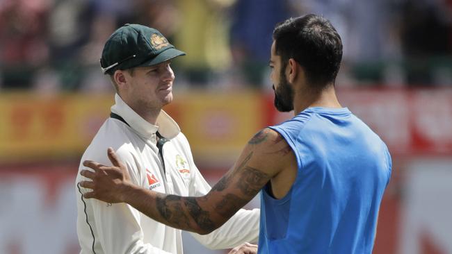 Steve Smith and Virat Kohli shake hands after the fourth Test.