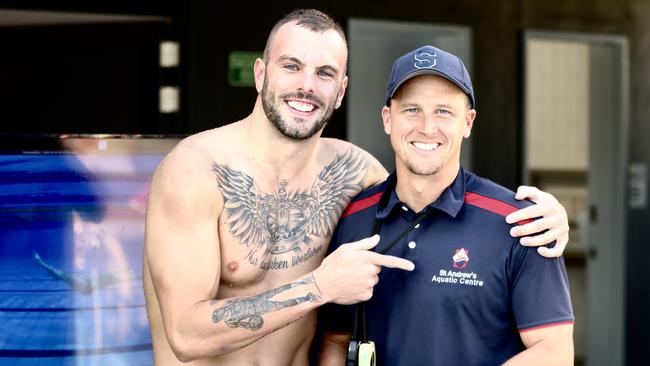 St Andrew's Anglican College swimming head coach Ash Delaney (right) and champion swimmer Kyle Chalmers. Picture: Facebook.