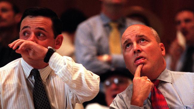 Traders watch share prices tumble at the ASX in April 2000. Picture: Grant Turner