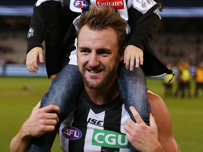 AFL Round 6. Geelong vs. Collingwood at the MCG. lynden Dunn and his son Emmett after his 1st win as a magpie  . Pic: Michael Klein