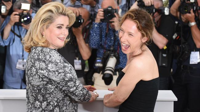 Catherine Deneuve and Emmanuelle Bercot pose for photographers during a photo call for the film La Tete Haute (Standing Tall), at the 68th international film festival, Cannes.