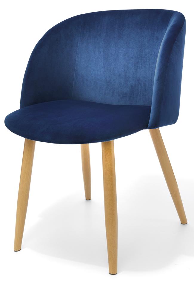 Look out for pieces like this velvet chair from the new Kmart range for $39. Picture: Kmart